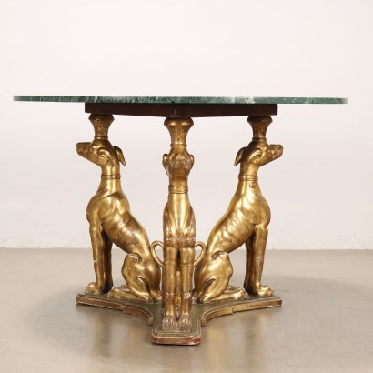 Table ronde avec sculptures de lévriers