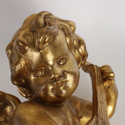 Putto Musicante in Legno Intagliato e