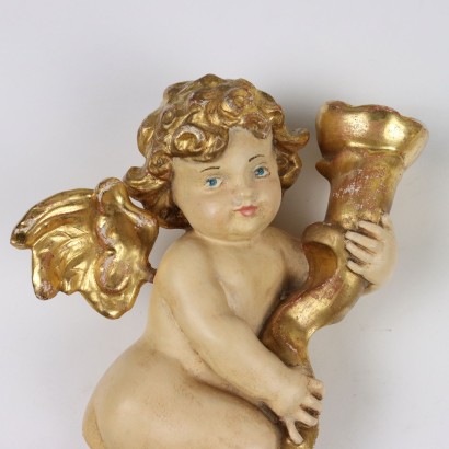 Coppia di Putti in Legno Intagliato