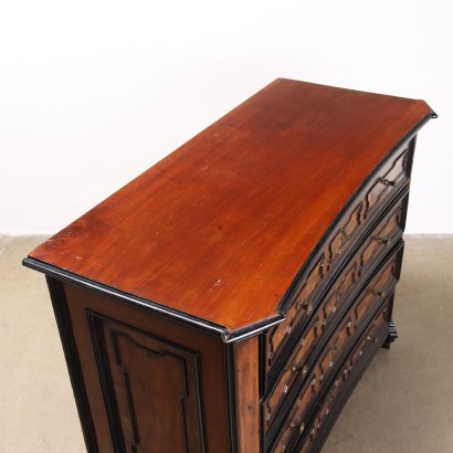 chest of drawers with a drop-leaf